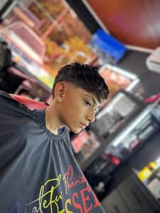 Corte de cabello de hombre y niños